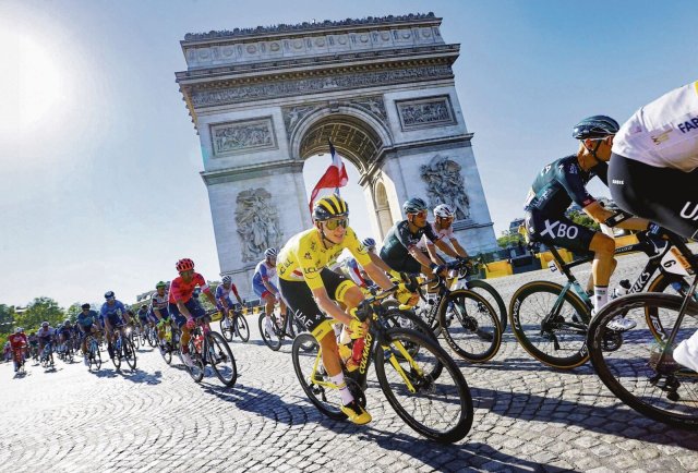 Auffälliges Gelb: Der zweimalige Tour-Sieger Tadej Pogacar ist schneller als einst Lance Armstrong.