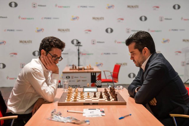 Fabiano Caruana (l.) und Jan Nepomnjaschtschi sind die beiden Teilnehmer in Madrid, die schon mal ein Kandidatenturnier gewinnen konnten.