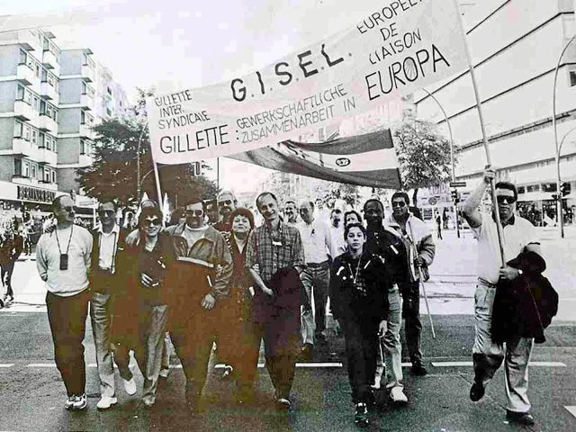 Gillette-Kolleg*innen aus England, Frankreich, Italien und Spanien auf der 1. Mai-Demo 1990 in Berlin